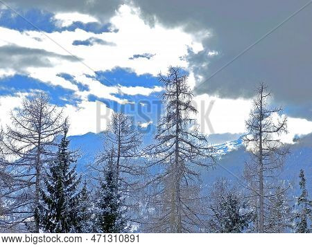 Beautiful Low Winter Clouds And Fog Condensation In The Swiss Alps Above The Tourist Resorts Of Valb