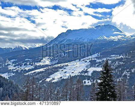 Beautiful Low Winter Clouds And Fog Condensation In The Swiss Alps Above The Tourist Resorts Of Valb