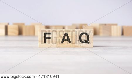 Faq - Word Concept Written On Wooden Cubes Or Blocks On A Light Background