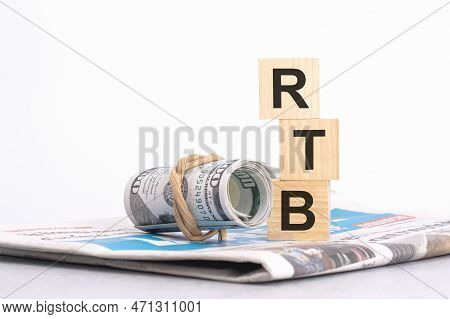 Text Rtb On Wooden Cubes Over Blur Background With Copy Space, Financial Concept Background
