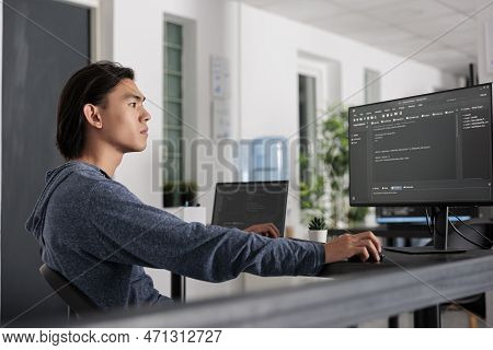 It Engineer Using Programming Computer To Write Html Code On Terminal Window, Creating New Web Inter