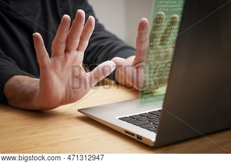 Hands Recoil In Stop Gesture From The Laptop Computer, As Unknown Code Appears On The Screen, Concep