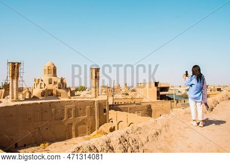Scenic Kashan Rooftop Panorama With Wind-catchers And Tourist In Hot Summer Day