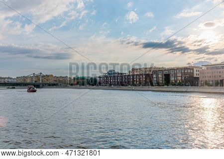 Krymsky Bridge Or Crimean Bridge In Moscow And Cruise Ship Sails On The Moscow River. Steel Suspensi