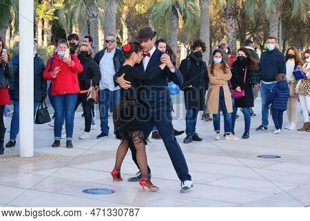 Málaga, Andalusia, Spain: 5.12.2021 - Street Dancers Performing Tango Dance For Tourists