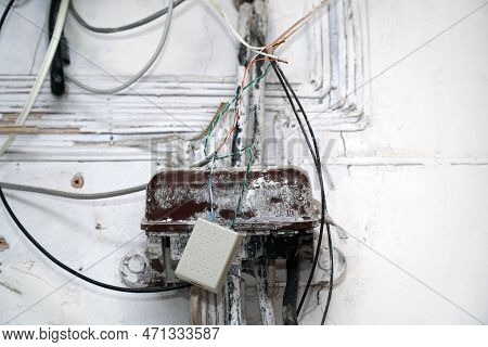 An Old Dirty Telephone Or Electrical Junction Box On The Wall. Selective Focus