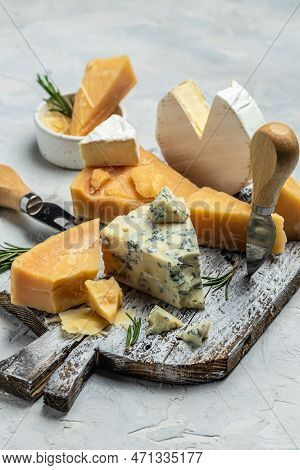 Parmesan. Cheeses Mix Set Dor Blu Chedar Camamber Brie. Different Types Of Cheese With Knife On A Li