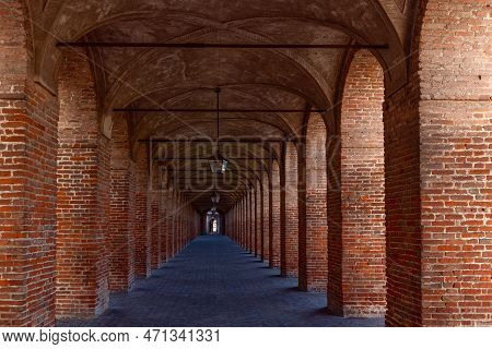 Red Brick Columns And Arches In Galleria Degli Antichi In Sabbioneta Town. Lombardy, Italy