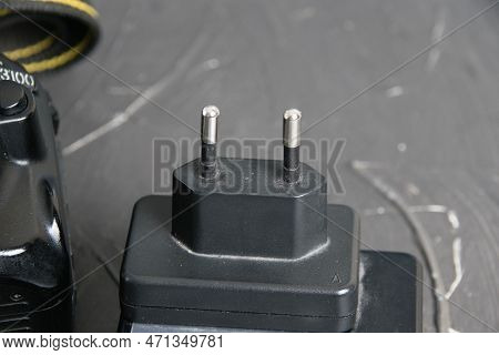 Ukraine, Chernihiv, February 21, 2023: Old Used Photo Equipment, A Charger From An Old Nikon Camera