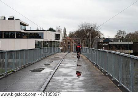 Grimbergen, Flemish Brabant Region -  Belgium - Feb. 19 2023 - Biking And Pedestrian Bridge Over The
