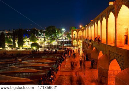 Isfahan, Iran - 15th June, 2022: Old Khajoo Bridge At Night, Across The Zayandeh River In Isfahan, I