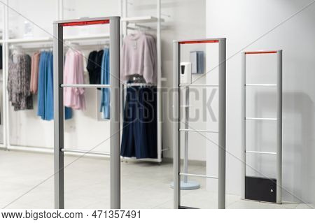 Close Up Anti-theft System In A Clothing Store. Entrance Gate With Scanner To Prevent Theft