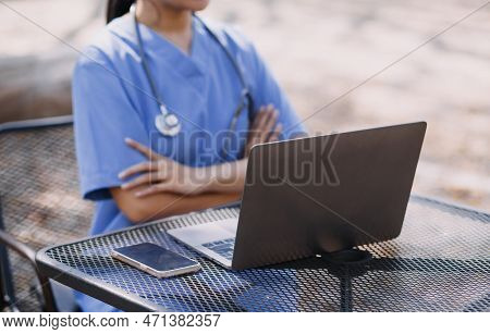 Asian Young Caregiver Nurse Support Senior Older Male Walking Outdoors. Specialist Girl Doctor Help