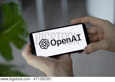Irpen, Ukraine - January 20 20223, Closeup Of Smartphone Screen Openai Logo Lettering With In Mans H