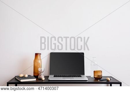 Interior Design Of Minimalist Stylish Office Interior With Copy Space, White Wall, Laptop, Black Des