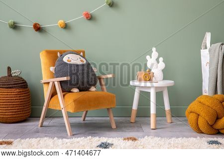 Creative Composition Of Stylish And Cozy Child Room Interior Design With Greeen Wall, Plush Toys, Or