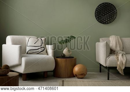 Stylish Composition Of Living Room Interior With Green Wall, Grey Sofa With Pillow. White Armchair W