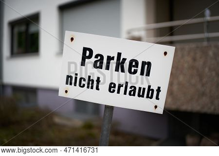 Sign In Front Of A House In Germany With The Inscription Parken Nicht Erlaubt. Translation: Parking 