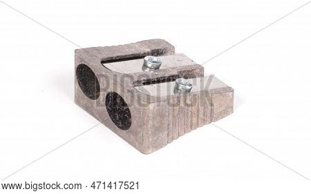 Old Manual Metal Pencil Sharpner On White Background