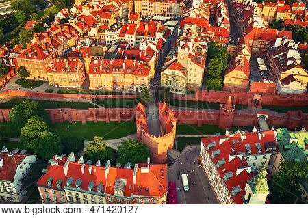 Old City In Warsaw With Red Roofs, Poland From Above. Travel Outdoor European Background With Wall A