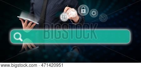 Businessman In Office Suit Holding Tablet And Pen. Written Virtual Text On Screen. Futuristic Image 