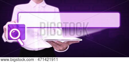 Lady In Office Suit Holding Tablet And Pen. Pointing On Fufturistic Element On Screen. Image With Co