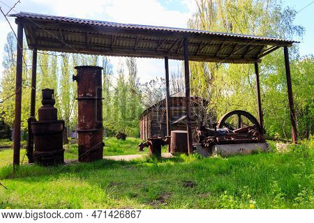 Old Steaming Threshing Machine In Open Air Museum Of Folk Architecture And Folkways Of Middle Naddni