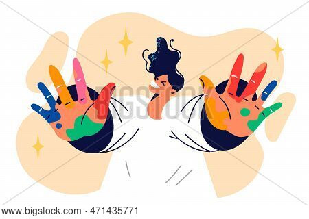 Happy Boy Artist In Adolescence Shows Palms Smeared With Multi-colored Paint After Classes At Art Sc