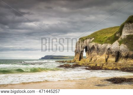 Crashing Waves And Limestone Rock Formations On White Rocks Beach, Causeway Coast, Wild Atlantic Way