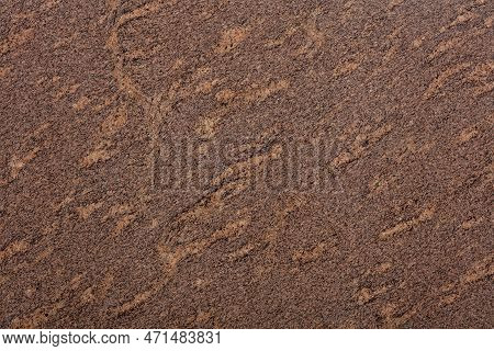 Giallo California Granite Background, Texture In Brown Tone As Part Of Your Design. Slab Photo.
