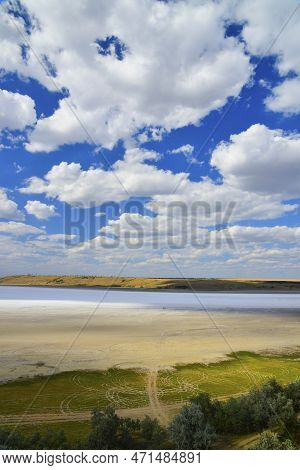 Kuyalnitsky Estuary - A Salt Desert On The Site Of A Drying Pond, White Thunderclouds Before The Rai