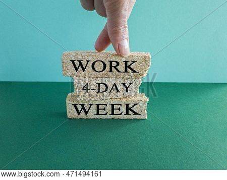 4-day Work Week Symbol. Concept Words '4-day Work Week' On Brick Blocks. Beautiful Blue Background. 