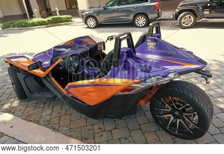 Miami Beach, Florida Usa - April 15, 2021: Blue Orange Polaris Slingshot, Back Corner View.