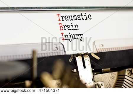 Tbi Traumatic Brain Injury Symbol. Concept Words Tbi Traumatic Brain Injury Typed On Retro Old Typew