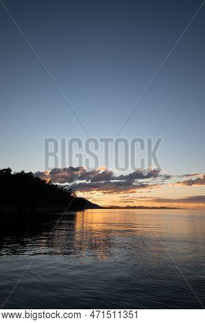 Sunset Scene Over Mountains With Reflection On Water, Near Thetis Island, Vancouver Island, British 