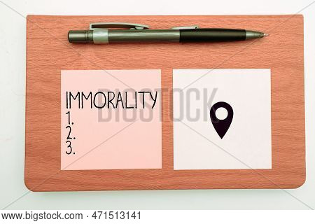 Hand Writing Sign Immorality. Business Concept The State Or Quality Of Being Immoral, Wickedness