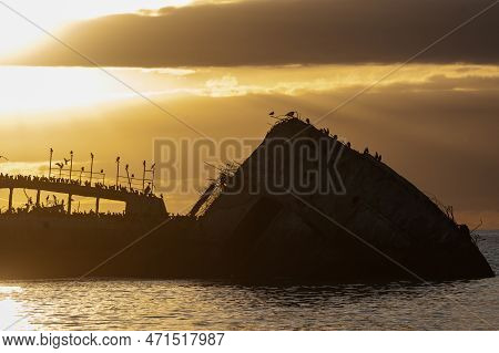 Silhoutte Of The Ss Palo Alto Near Sunset, An Old World War Ii Shipwreck Off The Coast Of Aptos, Cal