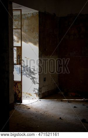 Empty Abandoned Creepy Deserted Room With Bright Sun Lights Entering The Windows