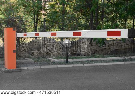 Closed Boom Barrier Outdoors On Sunny Day