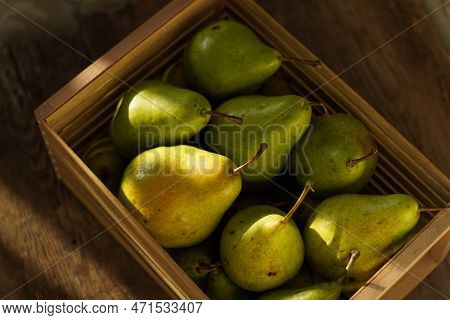 Pears On A Wooden Background. Fruit Harvest. Autumn Still Life. Pear Variety Bera Conference.