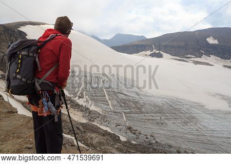 Man Looking At Mountain And Glacier Panorama In Glockner Group, Austria