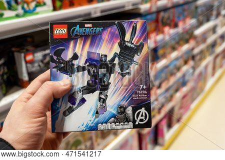Lego Marvel Avengers. Lego Constructor In Hand Of Buyer In A Toy Store. Marvel Avengers Lego Is A Li