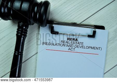 Concept Of Rera - Real Estate Regulation And Development Act Write On Paperwork Isolated On Wooden T