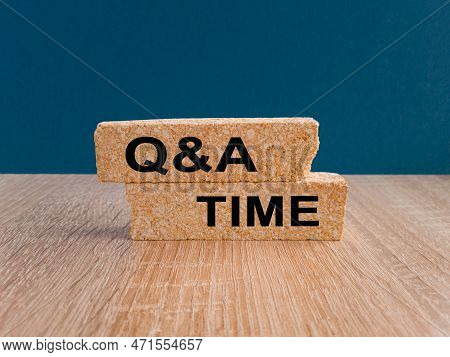 Q And A, Questions And Answers Time Symbol. Concept Words 'q And A Time' On Brick Blocks On A Wooden