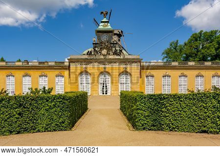 New Chambers (neue Kammern) Palace And Windmill (windmuhle) In  Sanssouci Park In Spring, Potsdam, G