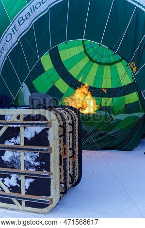 Heating Up A Hot Air Balloon. Taken At 42nd International Balloon Festival In Chateau D'oex In Janua