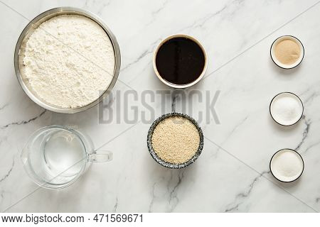 Home-made Turkish Simit Bread Pretzels Ingredients List: Flour, Pekmez, Water, Yeasts, Salt, Sugar, 