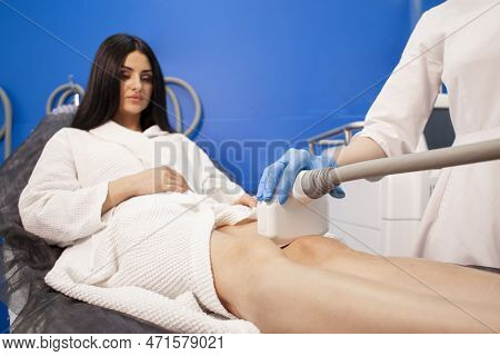 Coolsculpting Procedure In Cosmetology Clinic, Doctor Cosmetologist Makes Procedure For Removing Fat