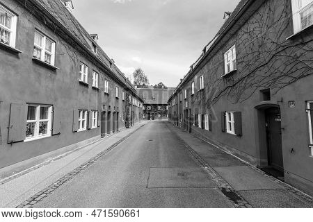 Augsburg, Germany - April 29, 2015: The Fuggerei Is The Worlds Oldest Social Housing Complex Still I
