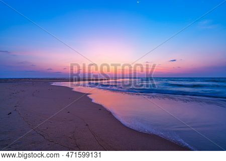 Beautiful Light Sunset Or Sunrise Over Sea, Colorful Dramatic Beach Scenery Sky With Amazing Clouds 